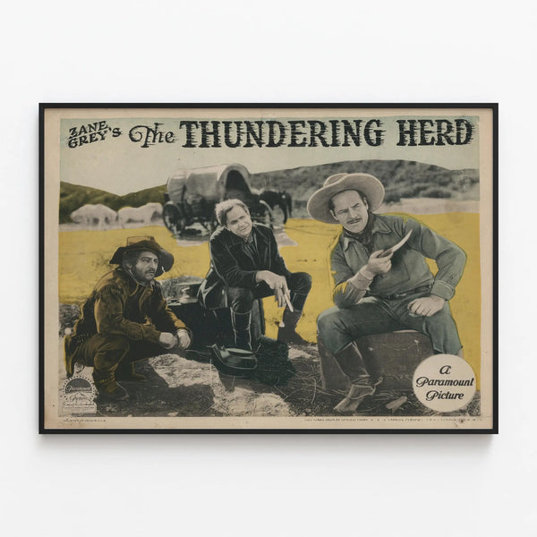 Vintage Western Poster Zane Grey's The Thundering Herd — framed artwork on a wall